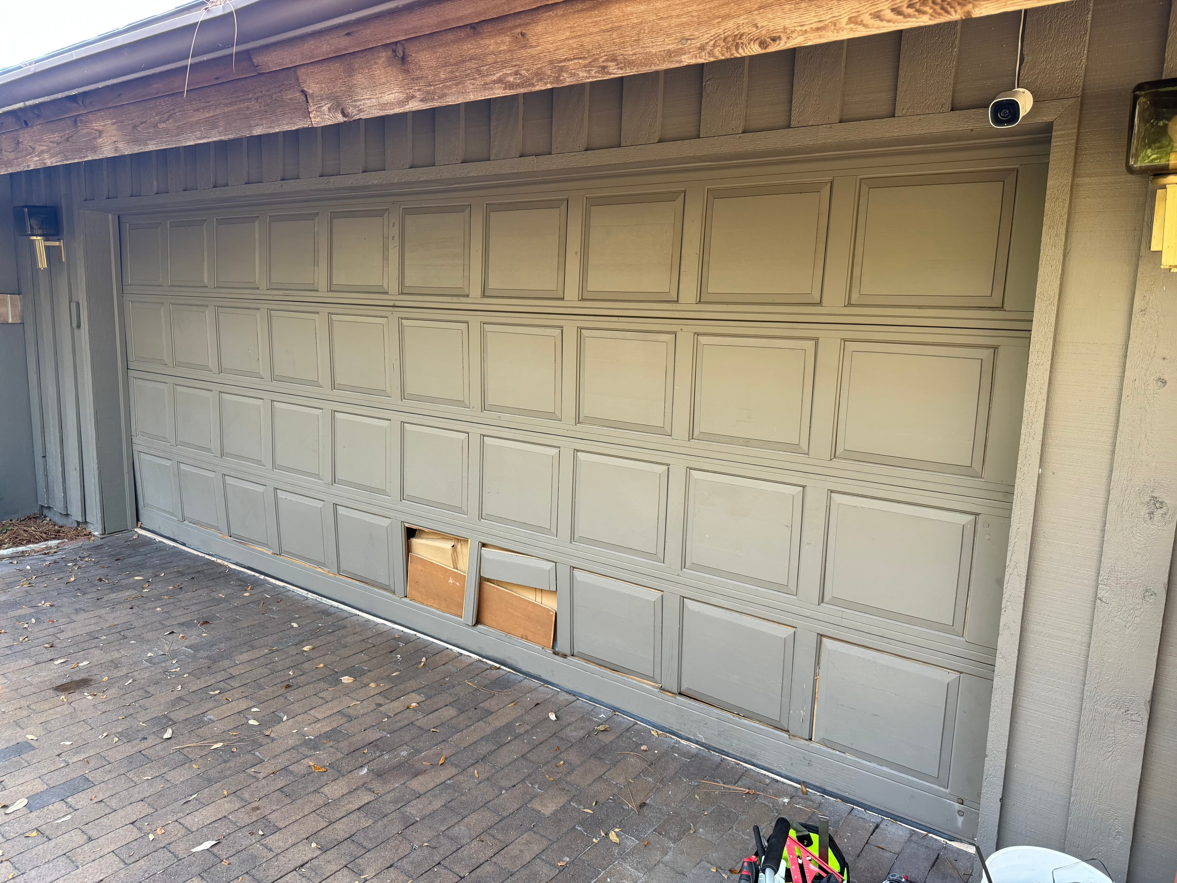 Garage door before repair